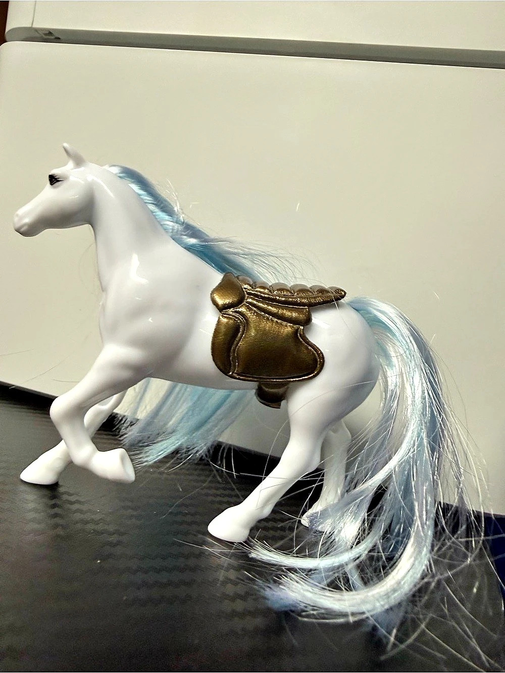 White Toy Horse with Blue Mane
